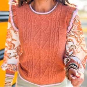 Boutique feminine fit mixed print sweater!